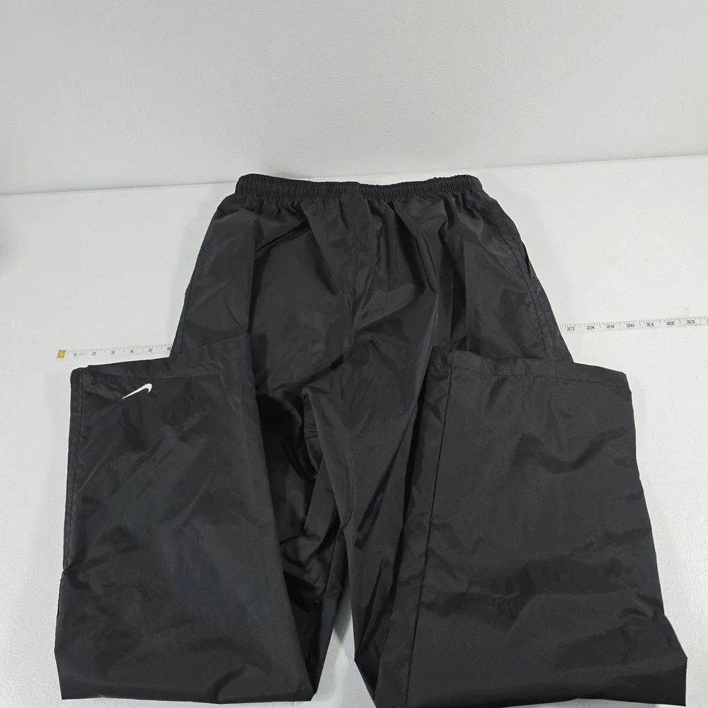 Nike Mens Large Black Nylon Track Pants Windbreaker Zipper Leg Swoosh RN 56323